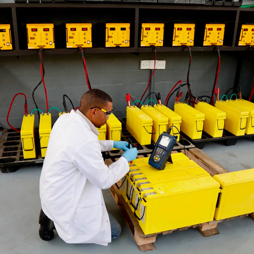 Battery technician testing a battery